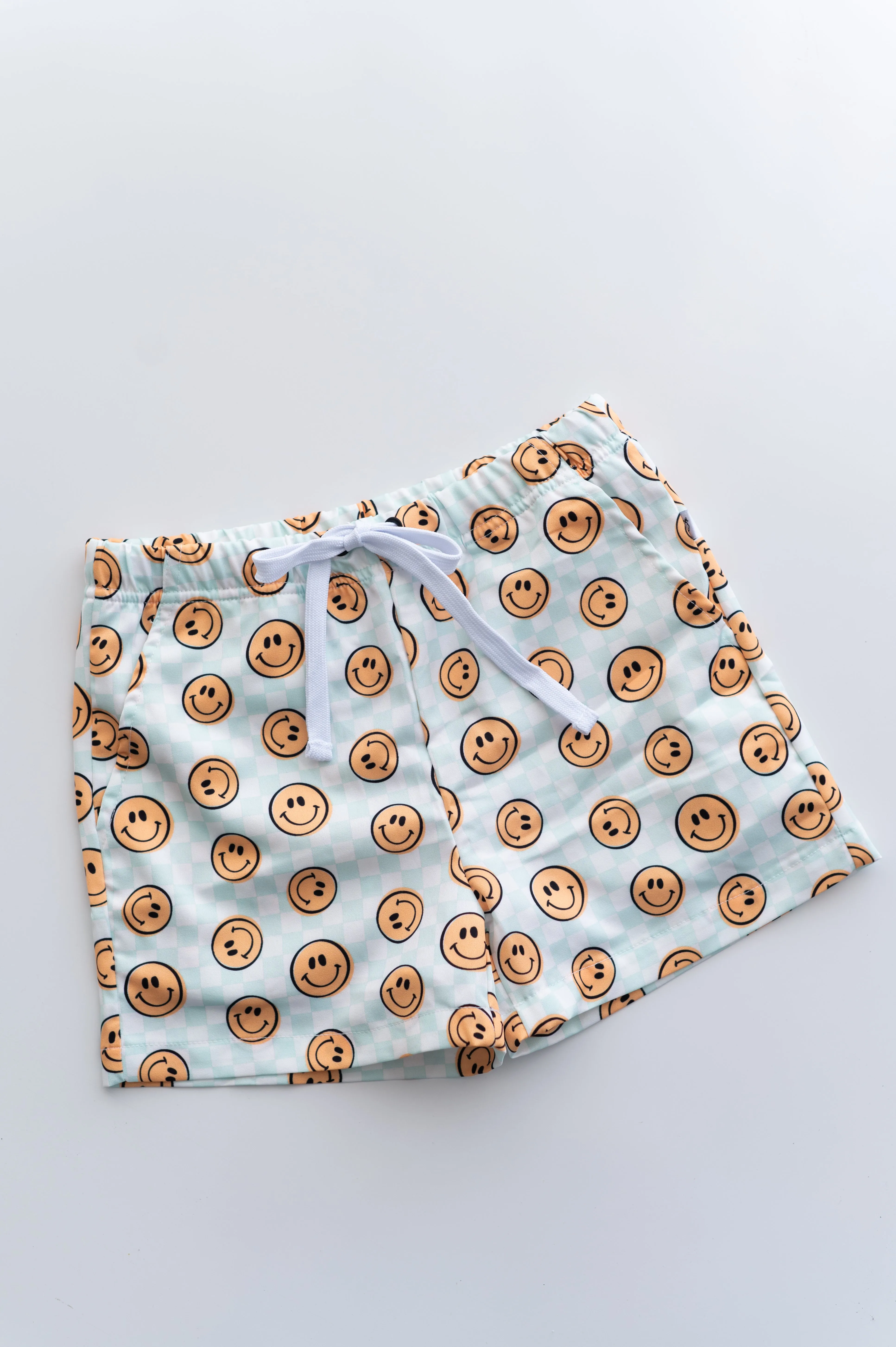 BE HAPPY CHECKERS DREAM SWIM TRUNKS