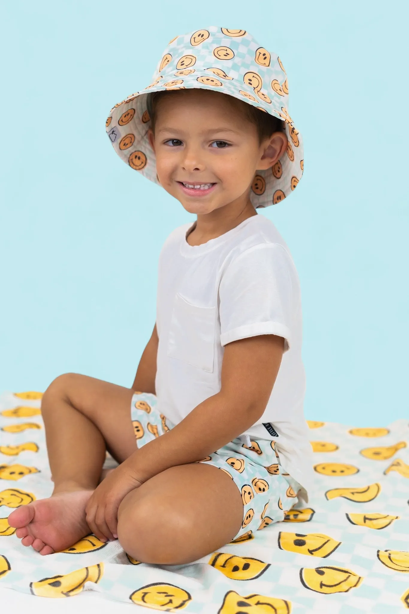 BE HAPPY CHECKERS DREAM SWIM TRUNKS
